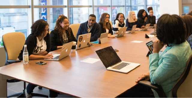 A group of people at a business meeting