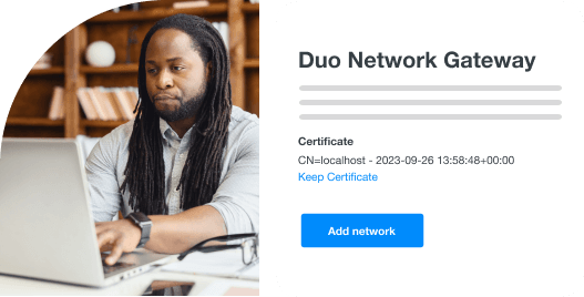 Man working on a laptop and a Duo Network Gateway screen